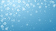 © Olga Moonlight - Christmas background of complex blurred and clear falling snowflakes in light blue colors with bokeh effect