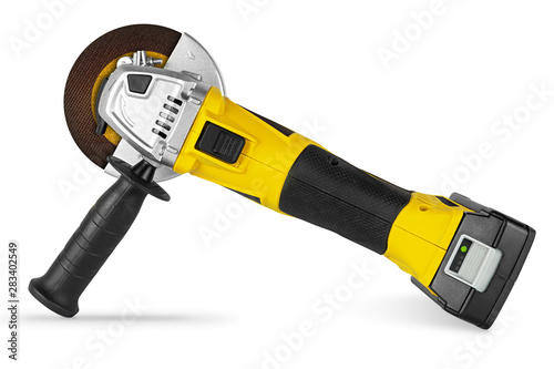 yellow cordless battery pack powered angle grinder electric hand diy constructio Tableau sur Toile
