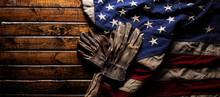 Old And Worn Work Gloves On Large American Flag - Labor Day Background