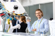© Pixel-Shot - Worker of modern dry-cleaner's at reception