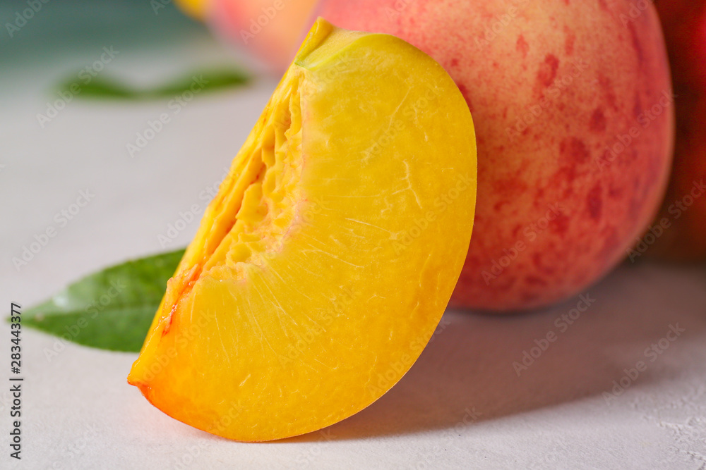 Ripe juicy peaches on table, closeup