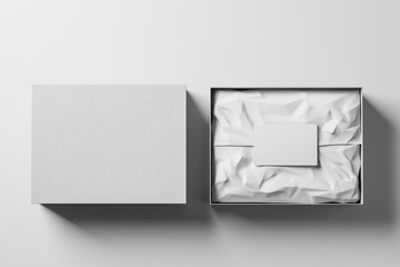 open and closed white realistic cardboard box with brown paper and a business card on a light backgr