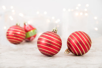 Wall Mural - Red Christmas Balls With Glittering Background