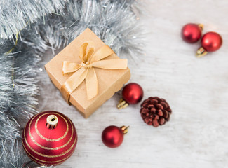 Canvas Print - Christmas Ornaments On White Wood With Glittering Background