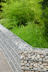 Poster - Decorative stones stored in the frame for a low wall.