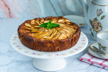 Canvas Print - Apple, ginger and honey cake garnished with fresh mint