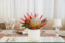 Pink Protea Flowers With Table Setting In Rose Gold