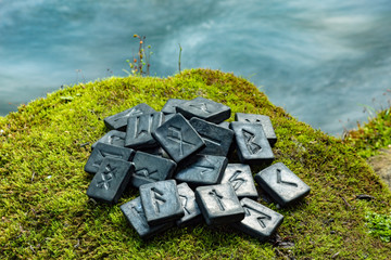 Sticker - 24 Norse runes on the green grass and the evening river background