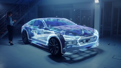 Wall Mural - Female Automobile Engineer Using Tablet Computer Augmented Reality with 3D CAD Software. Innovative Facility: Vehicle Frame Developing into Wire Frame Vehicle Prototype