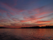 Sunset With Colorful Sky And Clouds On The River Danube In Novi Sad