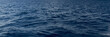Panoramic texture of sea water in the open blue ocean