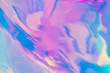 Abstract trendy holographic background in 80s style. Blurred texture in violet, pink and mint colors with scratches and irregularities. Retro futurism, webpunk, disco. Pastel colors.