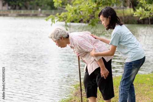 Cuadros en Lienzo Asian senior grandmother about to throw up,vomit,puke retch barf,feeling sick fr