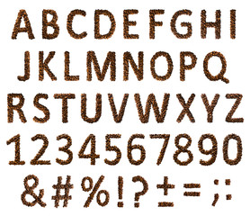 Concept of alphabet, numbers and signs laid out of roasted aromatic coffee beans isolated on a white background.