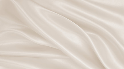 smooth elegant golden silk or satin luxury cloth texture as wedding background. luxurious background