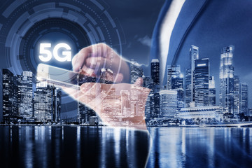 Poster - Business Technology Telecommunication and Communication 5G Network Connection Concept, Double Exposure of Businesswoman Using Mobile Phone for Communicating Information With Cityscape Background