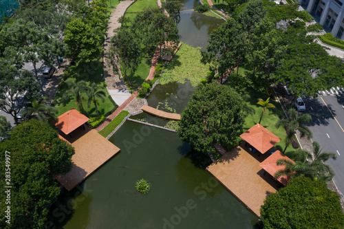 Aerial View Of Modern Urban Park Featuring Lakes Lush Gardens