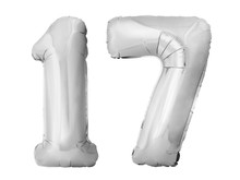 Number 17 Seventeen Made Of Silver Inflatable Balloons Isolated On White Background. Silver Chrome Helium Balloons Forming Seventeen Number