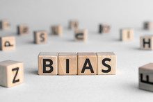 Bias - Word From Wooden Blocks With Letters, Personal Opinions Prejudice Bias Concept, Random Letters Around, White  Background