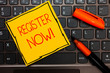 Writing note showing Register Now. Business photo showcasing Name in an Official List Enlist to be a Member Sign up Yellow paper keyboard Inspiration communicate ideas orange markers