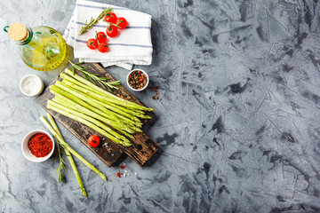 Sticker - Asparagus and tomatoes on rusticbackground