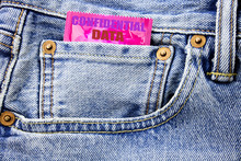 Handwritten Text Showing Confidential Data. Business Concept Writing For Secret Protection Written On Condom Pack In Small Pocket In The Pants Jeans.