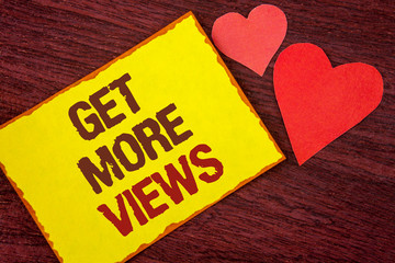 Poster - Conceptual hand writing showing Get More Views. Business photo text Increase web traffic optimise blog strategy analyse digitally written Yellow Sticky note paper wooden background Hearts.