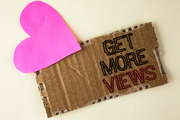 Poster - Handwriting text Get More Views. Concept meaning Increase web traffic optimise blog strategy analyse digitally written Tear Cardboard Piece on the plain background Heart next to it.