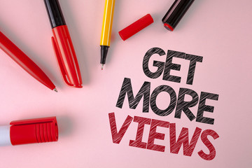 Poster - Conceptual hand writing showing Get More Views. Business photo text Increase web traffic optimise blog strategy analyse digitally written plain Pink background Pens and Marker next to it.