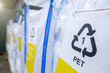 Sorting recyclables. The sorted polyethylene terephthalate (PET) plastic, is placed in a container with the appropriate marking.
