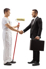 Poster - Painter shaking hands with a businessman