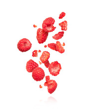 Whole And Sliced Raspberries In The Air, Isolated On A White Background