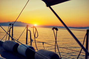 Wall Mural - View of a sailing ship front deck and open sea.