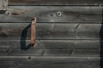 Aufkleber - Old door handle wooden board backgrpund texture.