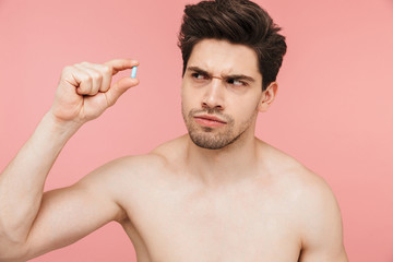 Wall Mural - Beauty portrait of a handsome shirtless brunette man