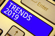 Word writing text Trends 2019. Business concept for Upcoming year prevailing tendency Widely Discussed Online Keyboard blue key Intention create computer computing reflection document