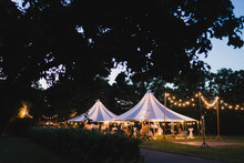 Coziness And Style. Modern Event Design. Lounge Zone And Wedding Reception Decorations Outdoors In The Evening.