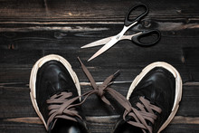 Unchained Concept -learn How To Tie Shoelaces. Concept Lifestyle - Tied Foot. Radical Liberation From Barriers And Complexes. Struggle With Hopelessness. 
