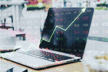 Poster - Business chart screen with growing yellow arrow and laptop on wooden table.