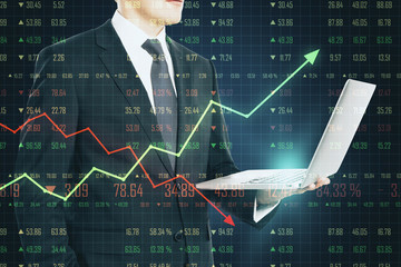 Aufkleber - Business chart concept with businessman using laptop and trading chart screen.