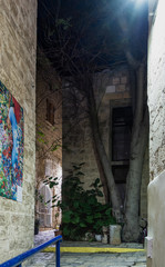 Wall Mural - A sign with the name of the street in Hebrew - Lane of the sign of the zodiac Virgin in on old city Yafo in Tel Aviv-Yafo in Israel