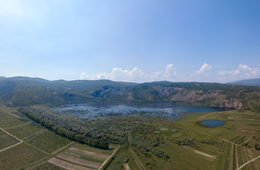 Wall Mural - Red Lake (Crveno jezero) Blue Lake (Plavo jezero) and sourrounding lakes of Imotsko Polje, Croatia are sites of greatest landscape diversity of Europe. 