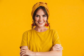 Poster - Portrait of a pretty young girl casualy dressed standing isolated