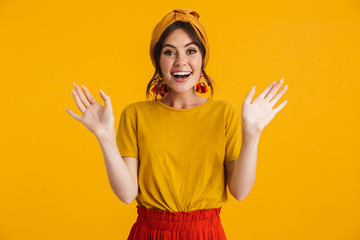 Poster - Portrait of a pretty young girl casualy dressed standing isolated