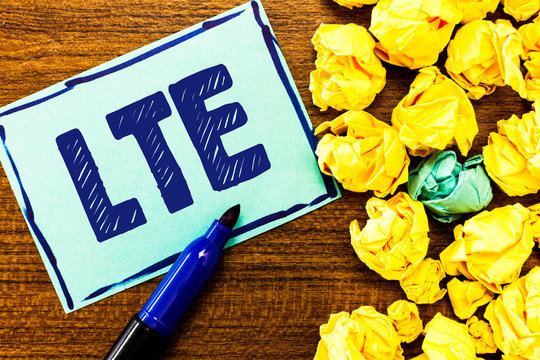 Word writing text Lte. Business concept for A 4G mobile communications standard Improving wireless broadband speeds.