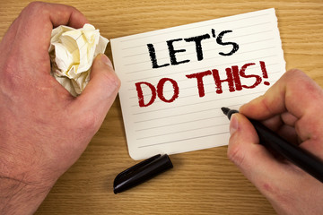 Handwriting text Let Us Do This Motivational Call. Concept meaning Encourage to start something Inspirational Text two words white paper note black marker hand crumbled paper note