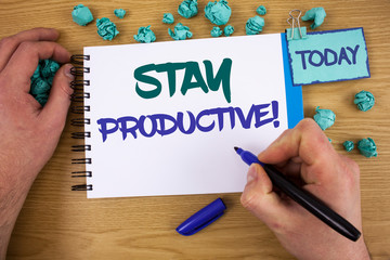 Writing note showing Stay Productive Motivational Call. Business photo showcasing Efficiency Concentration Productivity Text two words blue white notepad blue marker hand crumbled blue paper