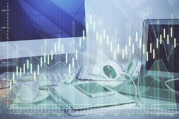 Multi exposure of graph and financial info and work space with computer background. Concept of international online trading.