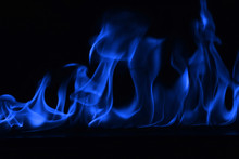 Beautiful Fire Blue Flames On A Black Background.
