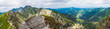 Panoramic view from Placlive peak on Western Tatra mountains or Rohace panorama. Sharp green mountains and lake rohacske pleso, ostry rohac, hruba kopa and volovec with hiking trail on ridge. Summer